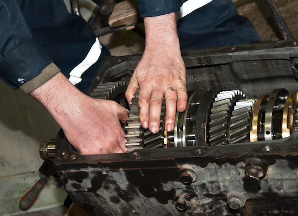 Technician Working on Transmission Part | Rix Automotive in Mason, OH
